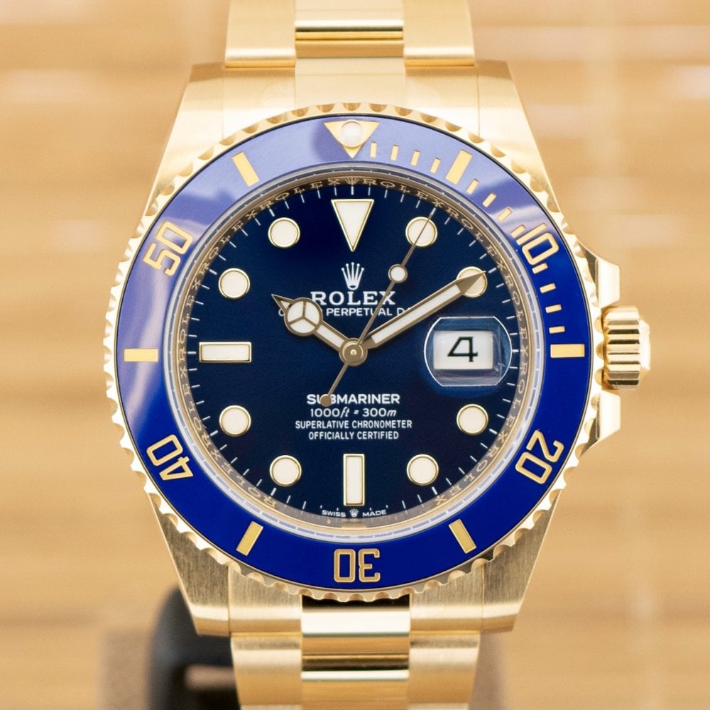 Submariner - Unworn with Box and Papers