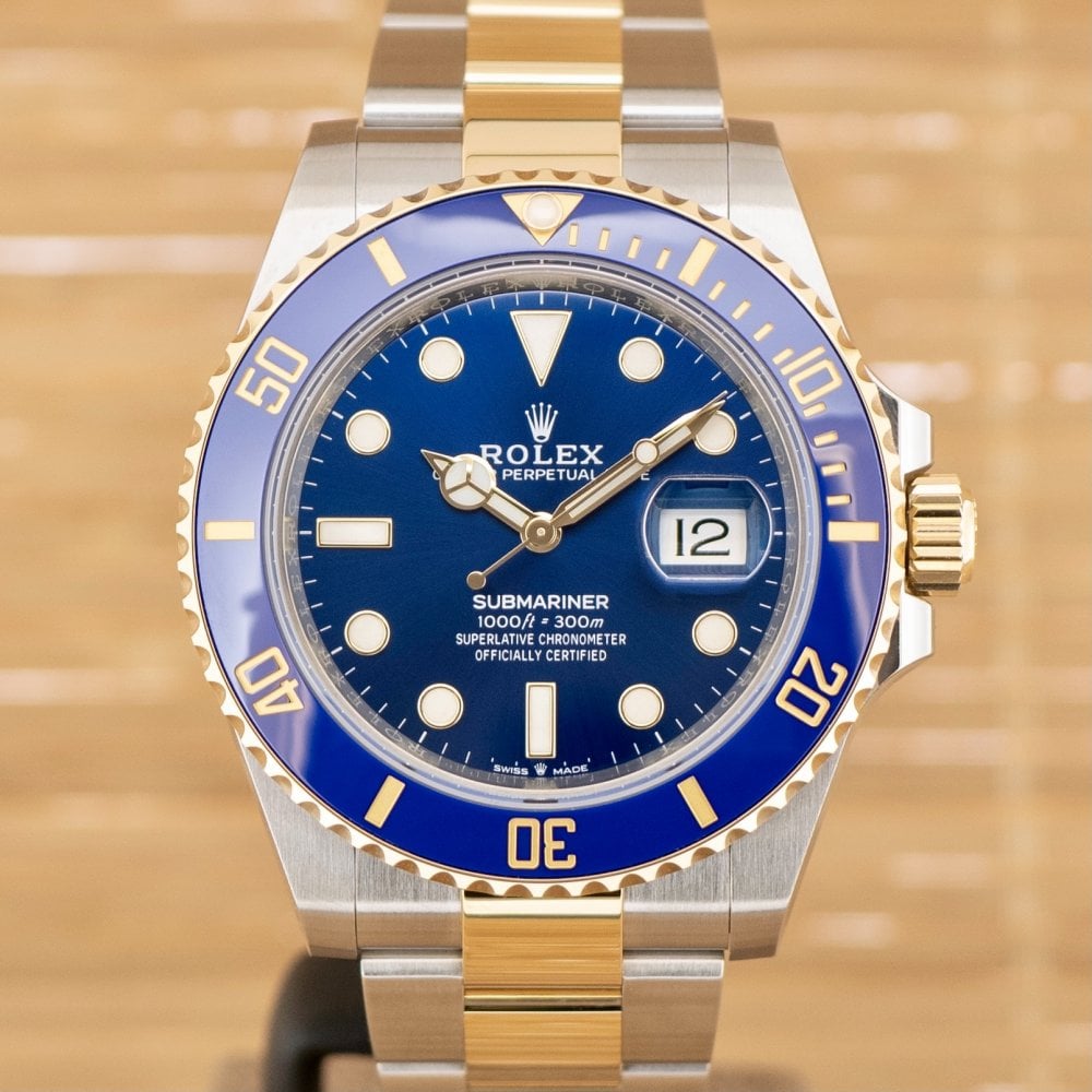 Submariner - Unworn with Box and Papers