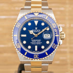 Submariner - Unworn with Box and Papers