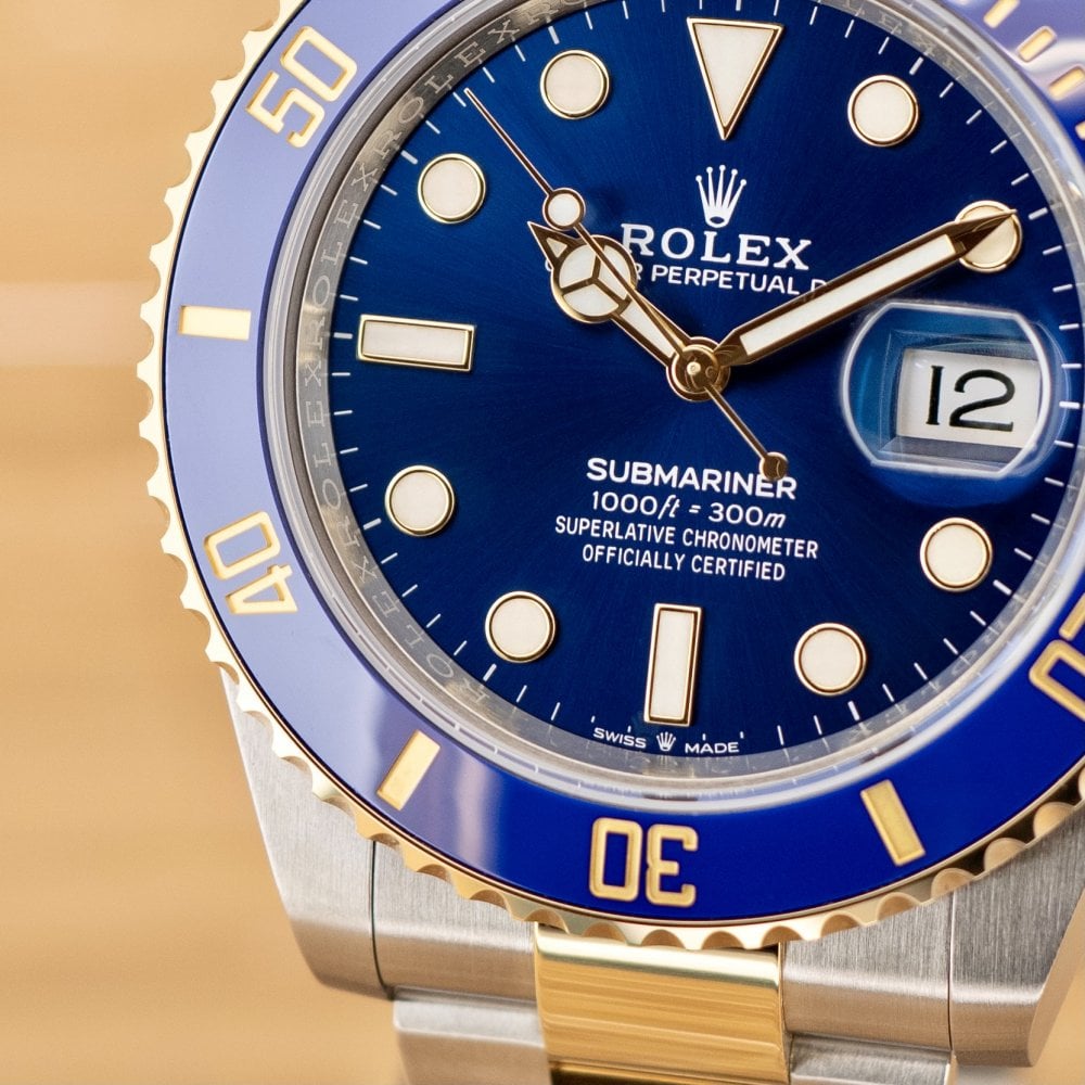 Submariner - Unworn with Box and Papers