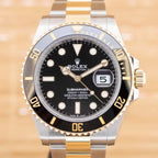 Submariner - Unworn with Box and Papers