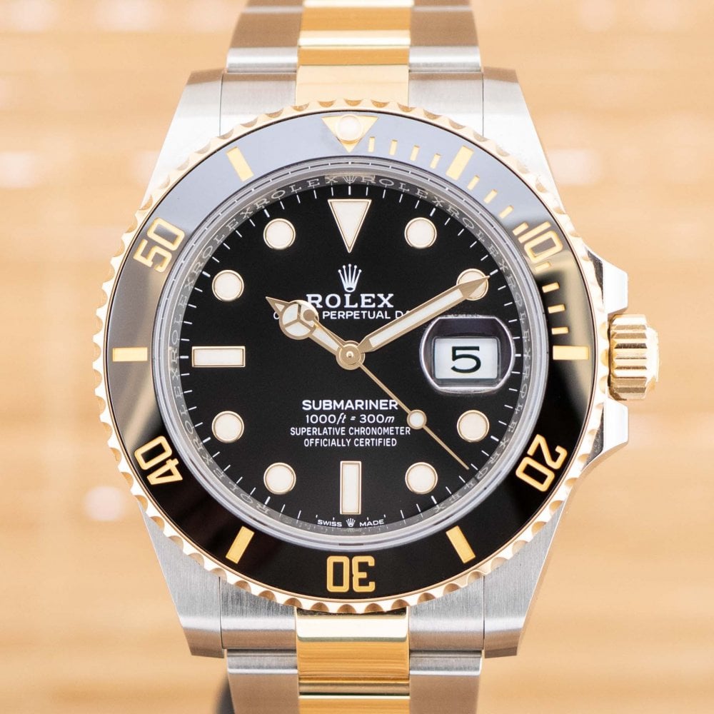 Submariner - Unworn with Box and Papers