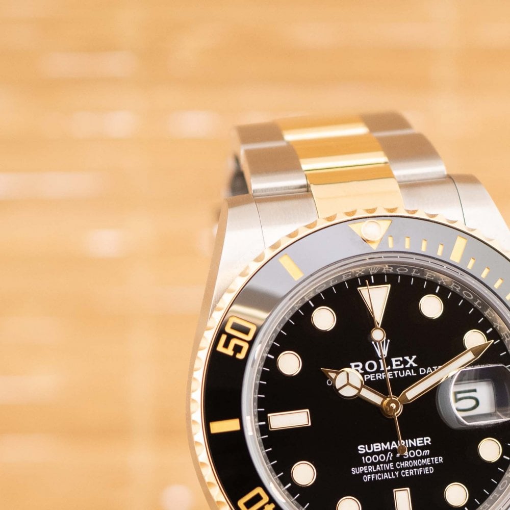 Submariner - Unworn with Box and Papers