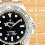 Rolex Submariner - Unworn with Box and Papers